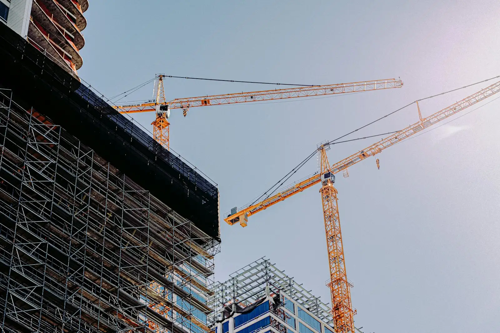 Tower cranes over a building under construction